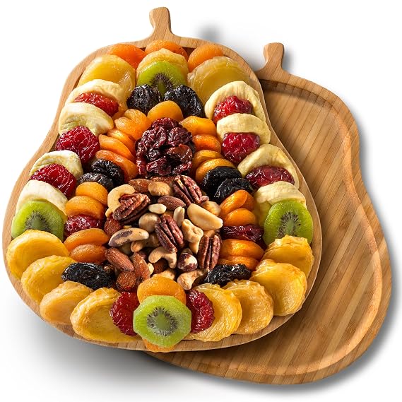 A Gift Inside Dried Fruit Gift Basket with Deluxe Mixed Nuts Gourmet Dried Fruit and Nuts Gift Basket with Pears, Apricots, Apples, Angelino Plums, Cherries & Prunes On a Pear-Shaped Bamboo Cutting Board